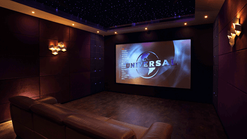 Cozy home theater room with a large screen and plush seating.